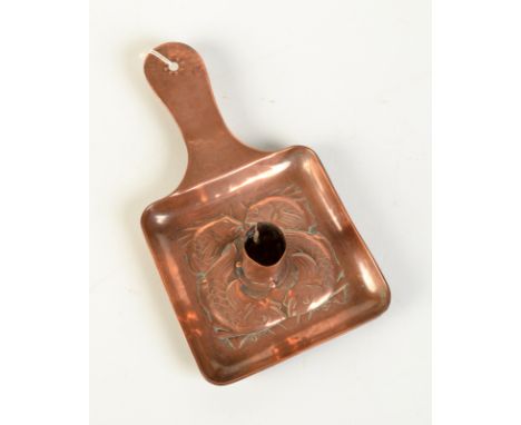 A Newlyn copper chamber stick decorated with four fish, impressed mark.