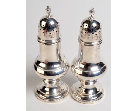 A pair of Birks Sterling baluster silver peppers, 100gms, height 12.5cm.