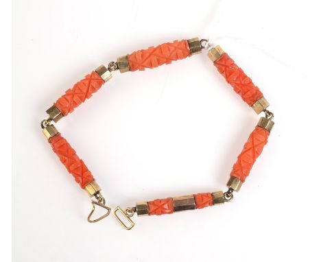 A Georgian gold mounted carved coral bracelet.
 Condition Report: Length 8.5 cm excluding catch. Condition good.
