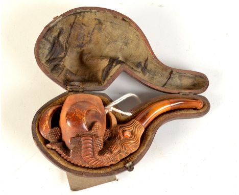 A meerschaum pipe the bowl held by a carved eagle's claw, fitted case. Condition Report: Signs of use, no cracks