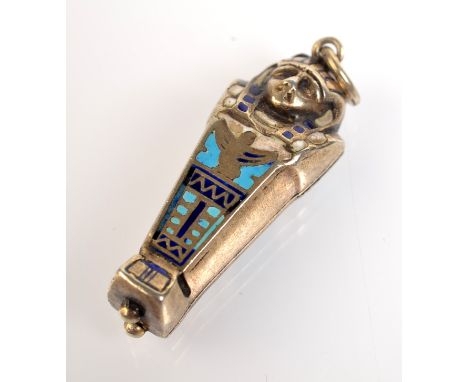 A silver and enamel mummy.