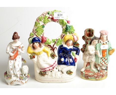 A Staffordshire figure, porcelain, depicting a lady with lute together with two earthenware Staffordshire figures, one a watc