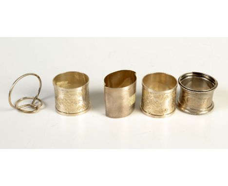 A COLLECTION OF RUSSIAN SILVER

A pair of Russian silver napkin rings with geometric engraving, together with three dissimila