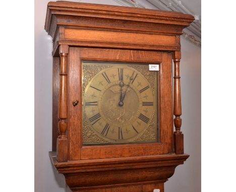 A thirty hour light oak long case clock, the brass face signed Josiah Stringer, Stockport. height 198cm.