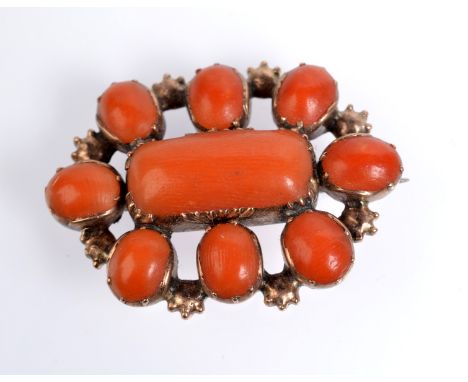 A Georgian gold and coral shawl pin brooch.