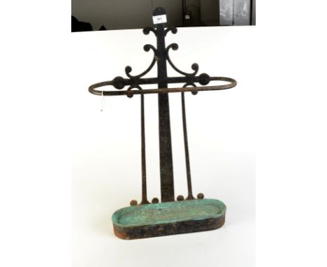 A wrought iron stick stand in the manner of Voysey. Condition Report: The full height from the floor to the top of the wrough