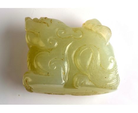 THE LESLIE DAVIE COLLECTION OF JADE

A Ming style white jade Dog of Foe with a puppy on its back, length 4cm, height 3.2cm.