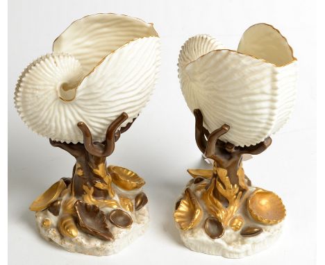 A pair of Royal Worcester shell dishes, the shells depicted sitting on coral stands with shell decorated base, circa 1870. He