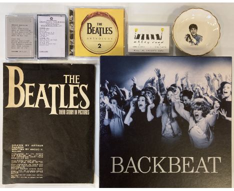 BEATLES MEMORABILIA. An assortment of Beatles collectables and memorabilia to include: Stuart Sutcliffe - Backbeat promo box,