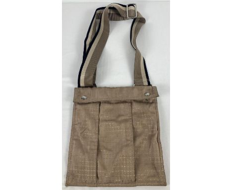A vintage DKNY camel nylon logo crossbody bag with striped canvas strap. Brown leather detailing, studded fastening to fold o