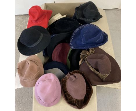 A large box of assorted vintage felt hats in varying colours and styles. To include Kangol. 