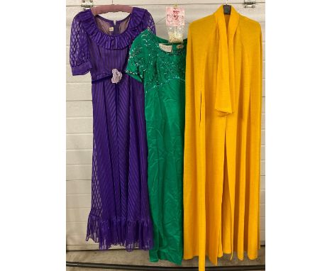 3 vintage mid century items of clothing. A mustard coloured maxi cape by Dobett, London; a 1960's Julian Rose of London sequi