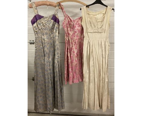 3 vintage 1950's sleeveless, full length evening dresses - 2 in floral designs. To include Lee Delman. 
