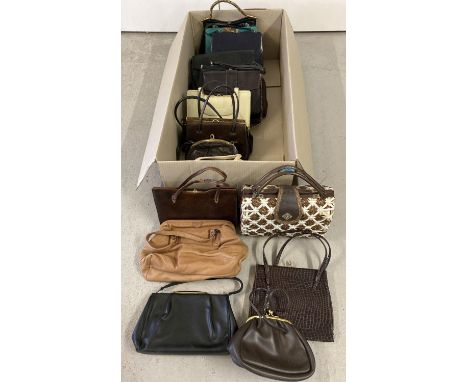 A collection of 20 assorted vintage kelly style handbags and shoulder bags. In varying colours, designs and conditions. 