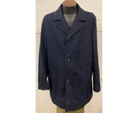 A mens Hugo Boss navy blue fully lined overcoat. Size 40 R. 