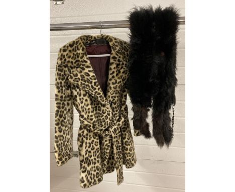 A faux leopard fur belted jacket by Debenhams approx. 36 inch chest. Together with a vintage dark fur stole. 