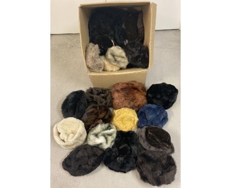 A large box of assorted vintage real &amp; faux fur hats and bonnets in various colours. 