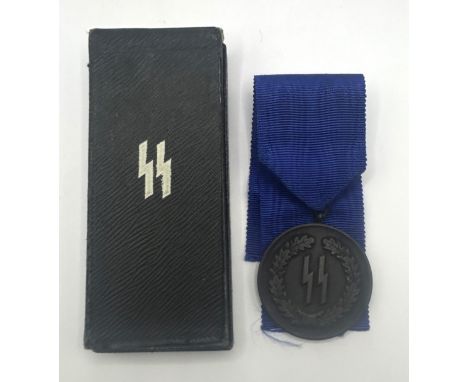 A German World War II SS 4 Year Service medal, boxed  Provenance: On Instructions of the Family: Medals and Militaria from th