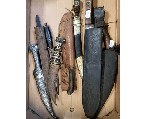 A Birmingham machete, dated 1917, in a leather scabbard, various daggers and other edged weapons (box)