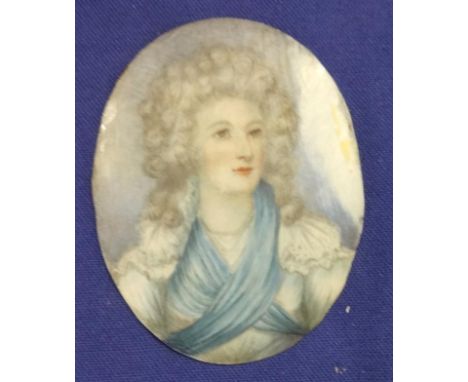 C18th Oval Miniature on Ivory, woman with ringlets in her hair, blue cross over sash dress, marked to rear, Harcourt (associa