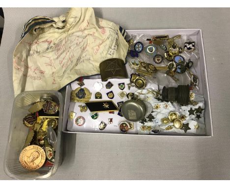 A collection of military badges, buttons & a naval scarf signed 