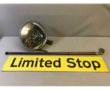 A mixed lot to include a Vintage bus convex mirror, 'limited stop' sign and a golf club walking stick 