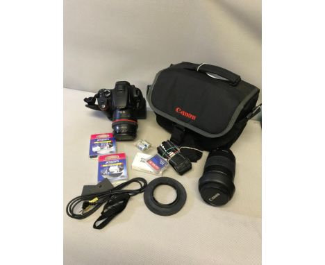 Canon EOS camera, together with canon lens, canon bag and camera accessories 