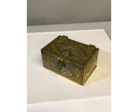 Unusual Arabic Small trinket chest with wood interior sides. Measures 4x8x5cm 