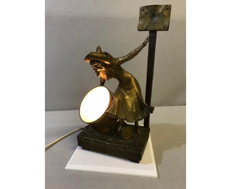 Bronzed spelter jester with drum lamp figurine. Working. Signed L Toilla. Stands 32cm in height 