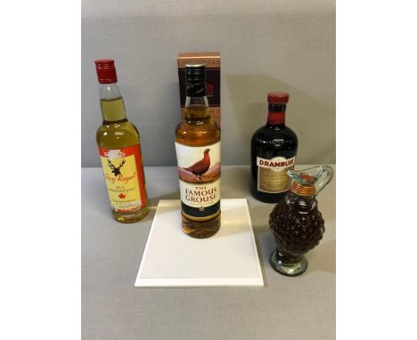 The Famous Grouse blended Scotch Whisky, Drambuie ages Scotch Whisky, Stag Royal whisky & one other 