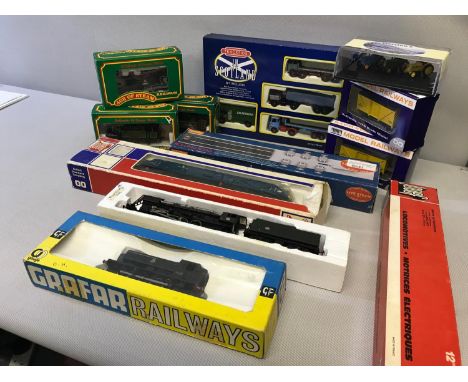 A mixed lot of train items to include names such as Jouef & Hornby together with a truck model set and tractor model set 