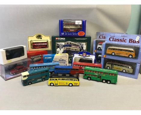 A mixed lot of various bus and car models (predominately bus models) to include names such as Corgi, together with 6 loose bu