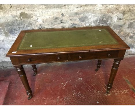 Victorian green leather top writing desk. Fitted with 2 under drawers, Supported on 4 turned leg supports with 4 heavy castor