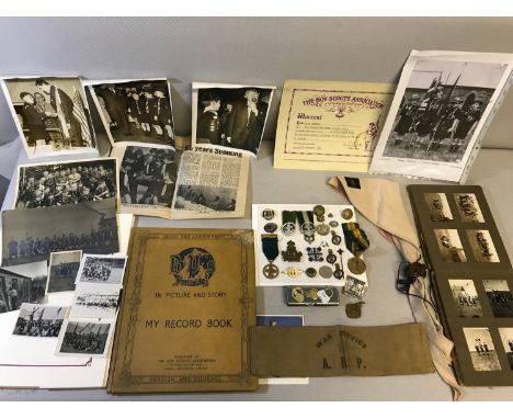 A Large collection of 1930's, 40's, 50's & 60's Boy Scout collectables which includes original photos, Albums, medals, badges