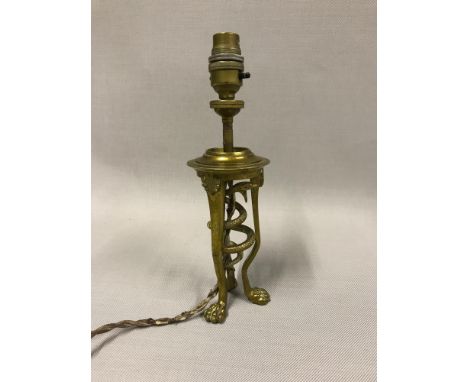 Antique brass snake design side lamp supported on three paw feet. Stands 26cm in height. 