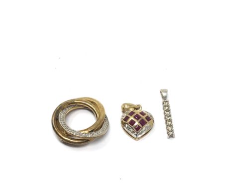 3 x 9ct yellow and white gold diamond set pendants inc. ruby (4.9g) 