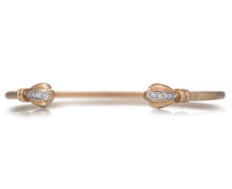 GEMSET BANGLE in nine carat gold Qty: 6.3g