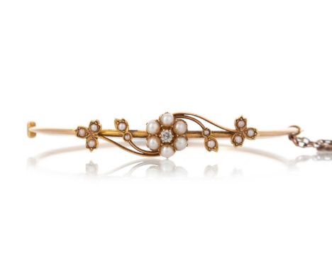 PEARL AND DIAMOND BANGLE with central flower cluster and radiating pearl sections, unmarkedQty: 6.9g