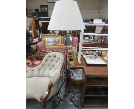 VICTORIAN BRASS AND CAST METAL EXTENDING STANDARD LAMP ON TRIPOD SUPPORTS 