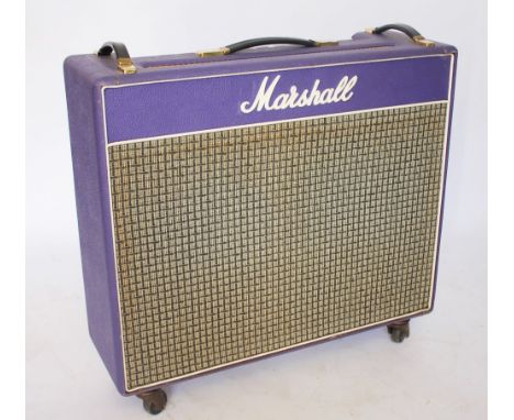 A Marshall Amplifier, with original cover (Not tested - sold as a decorative item only)