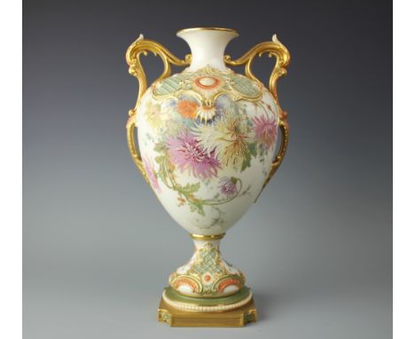 A Royal Worcester twin handled vase, with applied scroll detailing and painted with floral sprays, on canted square base, sha