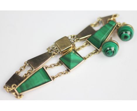 A malachite set bracelet, designed as seven malachite set panels, of tapering and square shape, with malachite set clasp and 