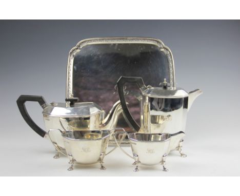 A George V Art Deco silver assembled four piece tea service, George Wish, Sheffield circa 1930, comprising tea pot and hot wa