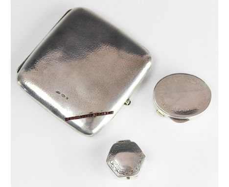 An Edwardian silver Arts and Crafts cigarette case, Steinhart & Co, with overall planished detailing set with ruby coloured s