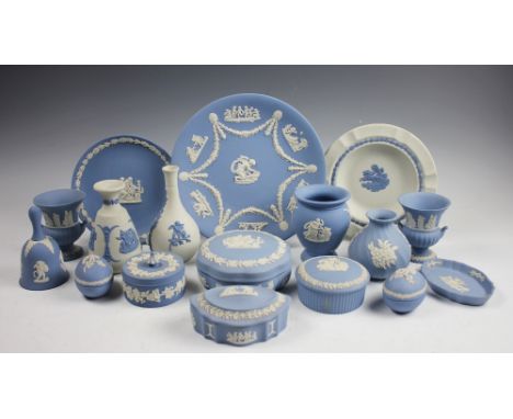 A selection of Wedgwood blue and white Jasper wares to include, a circular plate with a central Cupid and garland surround in