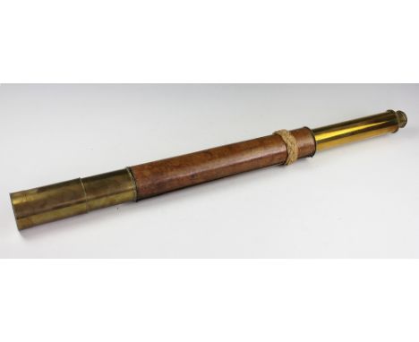 A 19th century Dollond of London lacquered brass 'Day or Night' telescope, single drawer with leather covered tube and lens c