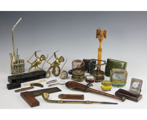 A selection of objects of virtue, to include; a 19th century treen page turner with eagle terminal, 28cm, a Swiss bird in a c