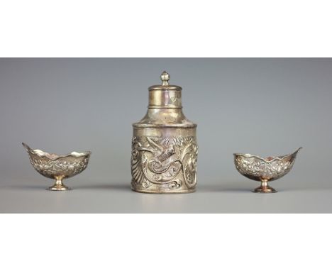 A Victorian silver tea caddy, Gibson & Co Ltd, London 1901, the cylindrical body embossed with serpents, birds and formal scr