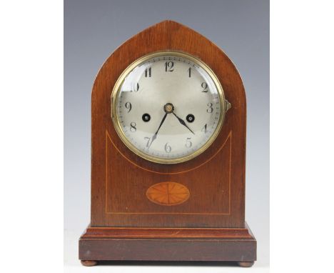 An Edwardian inlaid mahogany lancet shaped mantel clock, with silvered Arabic dial, 32cm high