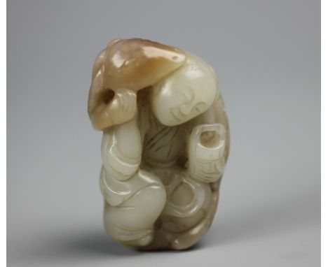 A Chinese Jade carving, lu ru feng mu group, depicting a smiling boy modelled kneeling holding a bucket attempting to milk a 